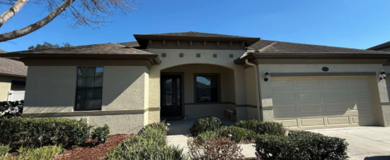 Supplied photograph of a single-story stucco home exterior